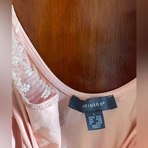 Primark / light pink body suit with puff sleeve / s